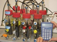A calculator, operating on a set of bacterial fuel cells. Fig 4 of the Lovley paper.